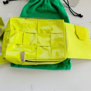 Bottega Veneta green leather messenger style.